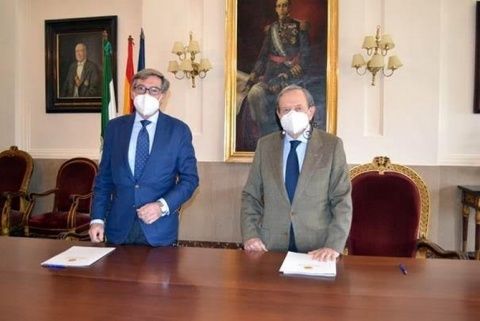 La firma del convenio.